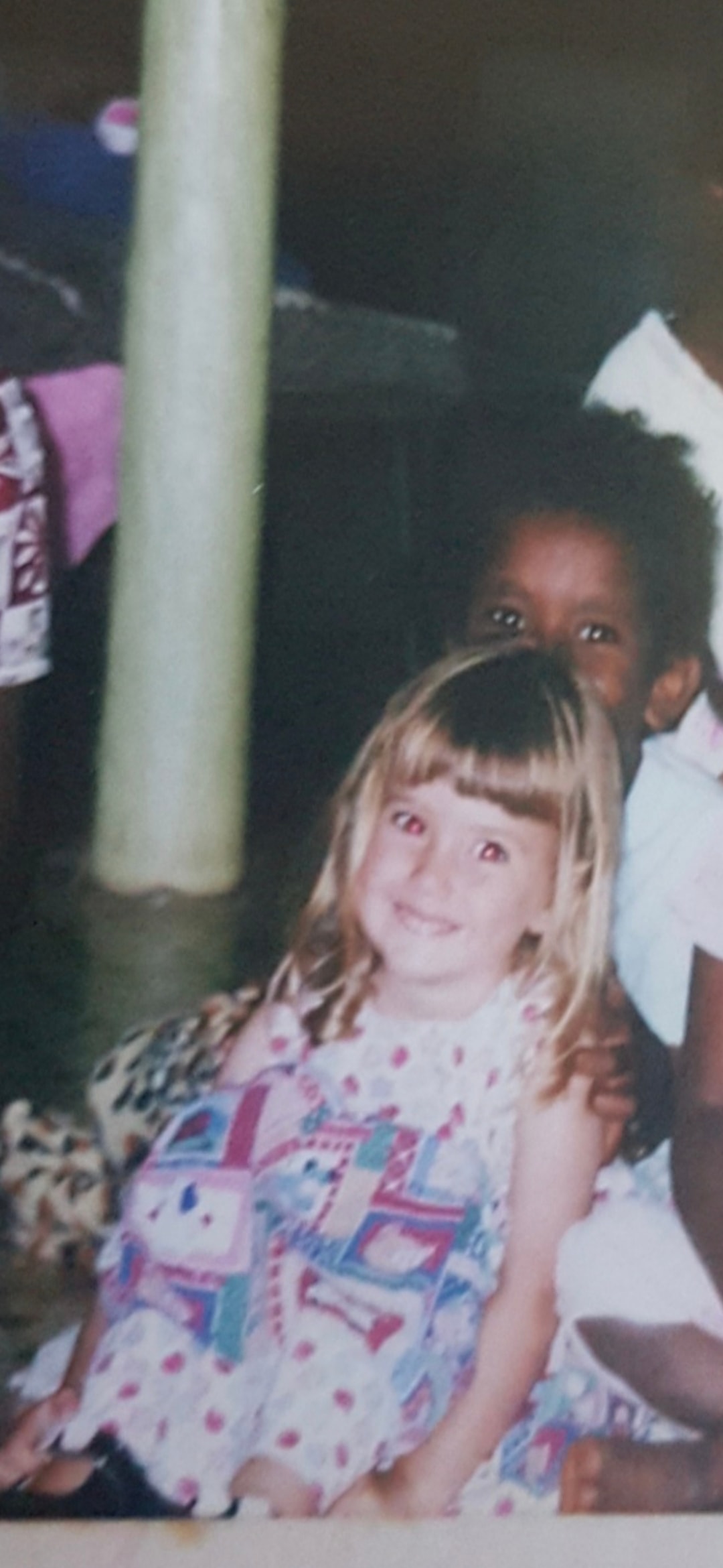 Elvira as a child growing up inside the group